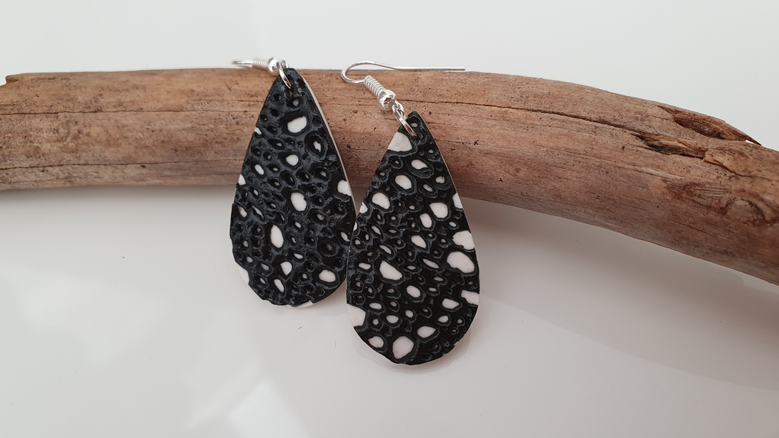 BUTINELY Boucles d'oreilles en relief style lunaire pour femme élégante collection météore