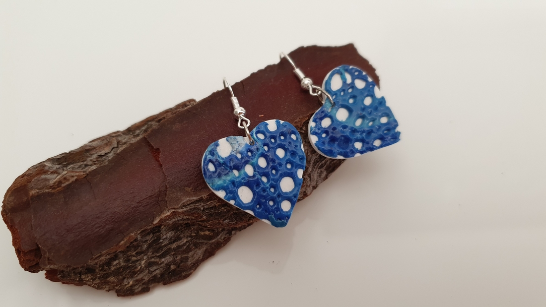BUTINELY Boucles d'oreilles en relief style lunaire pour femme élégante collection météore