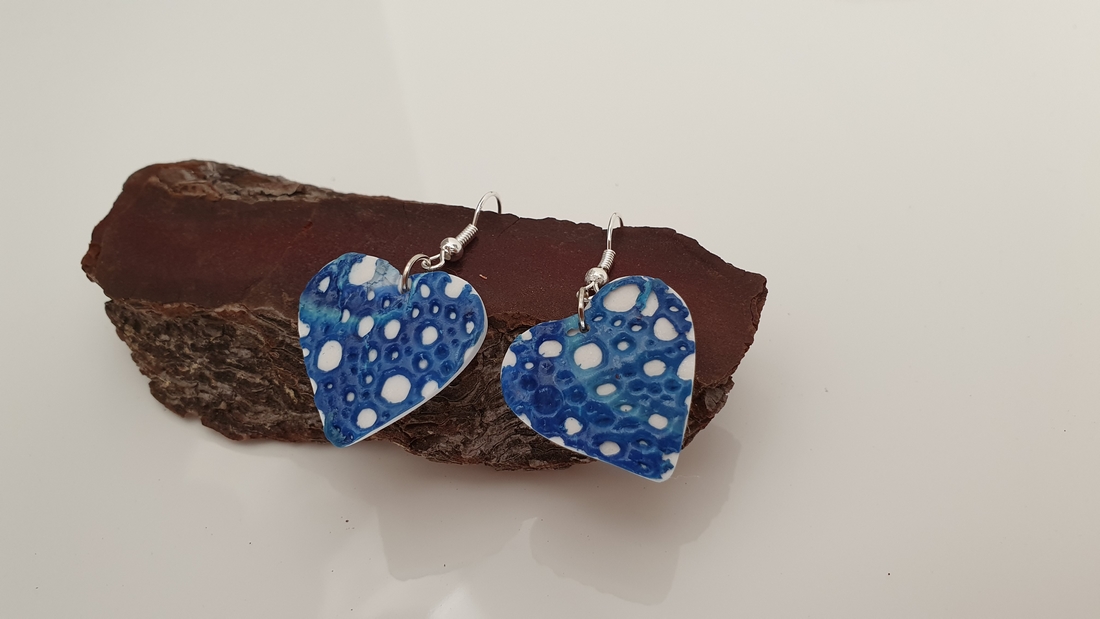 BUTINELY Boucles d'oreilles en relief style lunaire pour femme élégante collection météore